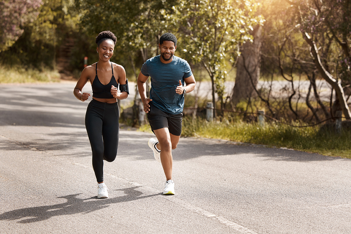 Man and woman running for exercise.